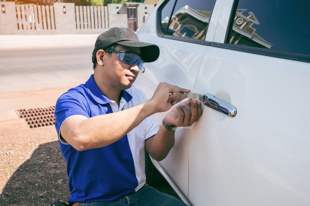 Emergency mobile locksmith working at night in Charlotte, NC